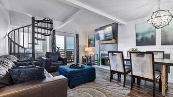 Signature Condo, 3 Bedrooms, Balcony, Mountain View | Living room | 55-inch Smart TV with cable channels, TV, fireplace