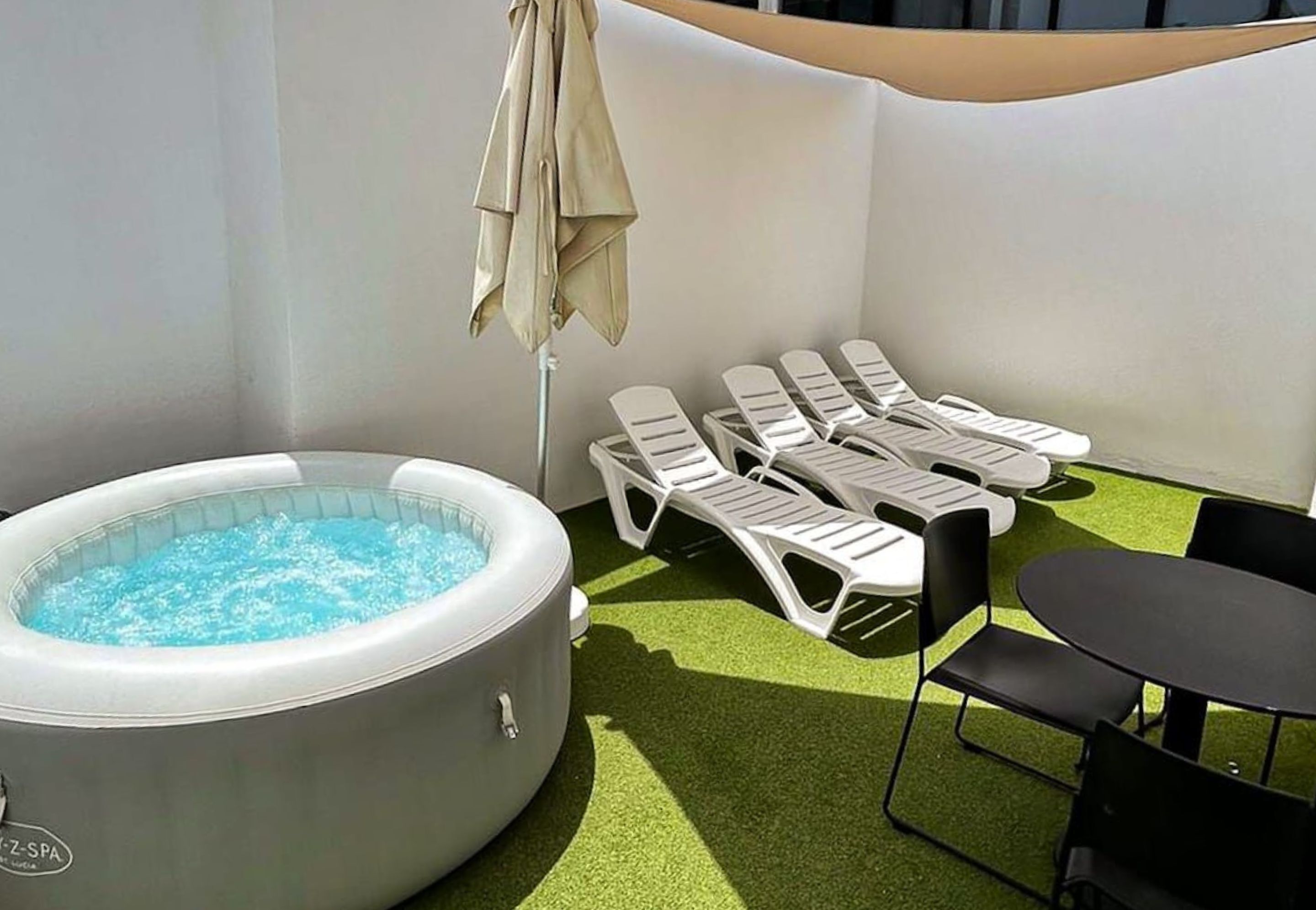 Club suite, 2 tweepersoonsbedden | Privéspabad