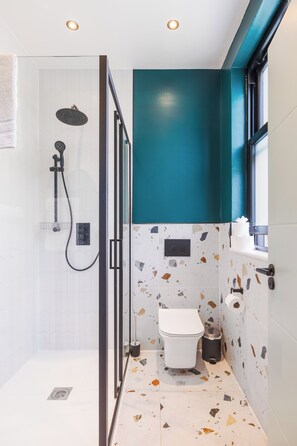 Shower, hair dryer, towels, soap