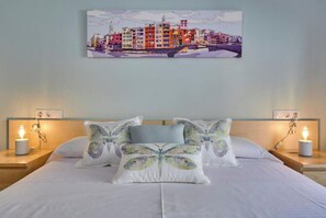 1 bedroom, desk, iron/ironing board, travel cot