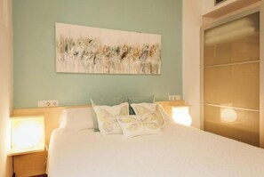 1 bedroom, desk, iron/ironing board, travel cot