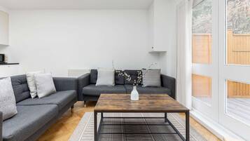 Apartment | Living area | 32-inch TV with cable channels, Netflix, streaming services