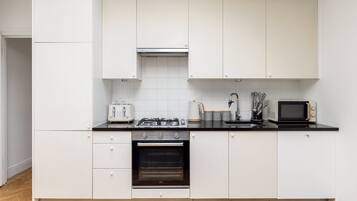 Apartment | Private kitchen | Fridge, microwave, oven, stovetop
