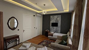 Economy Triple Room | Premium bedding, minibar, in-room safe, laptop workspace - Nuray Hotel (Istanbul)