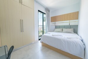 Deluxe Double Room, Balcony | Down comforters, pillowtop beds, in-room safe, individually decorated - Residence 110 (Phnom Penh)