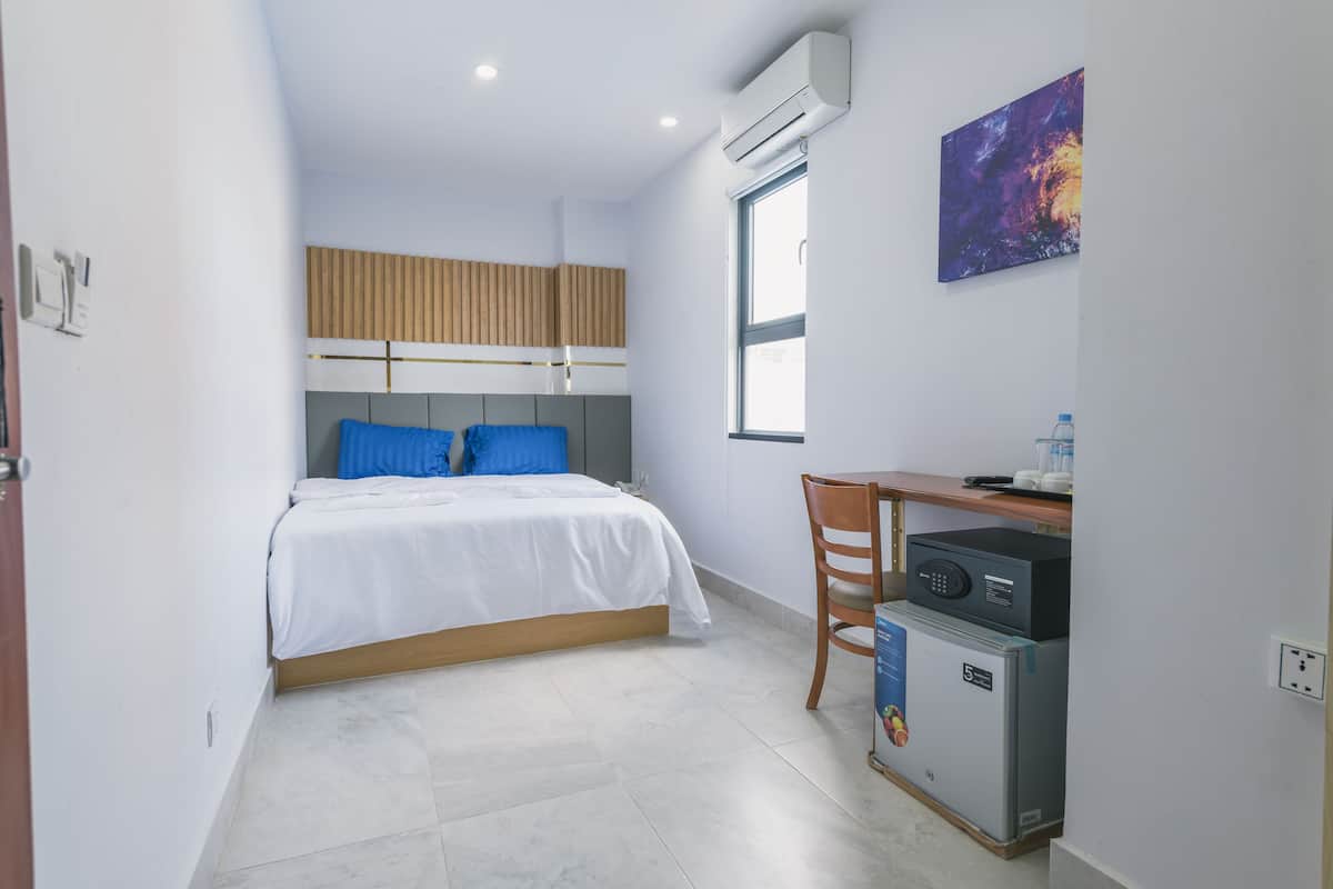 Habitación básica doble | Edredón, camas con pillow-top y caja de seguridad en la habitación