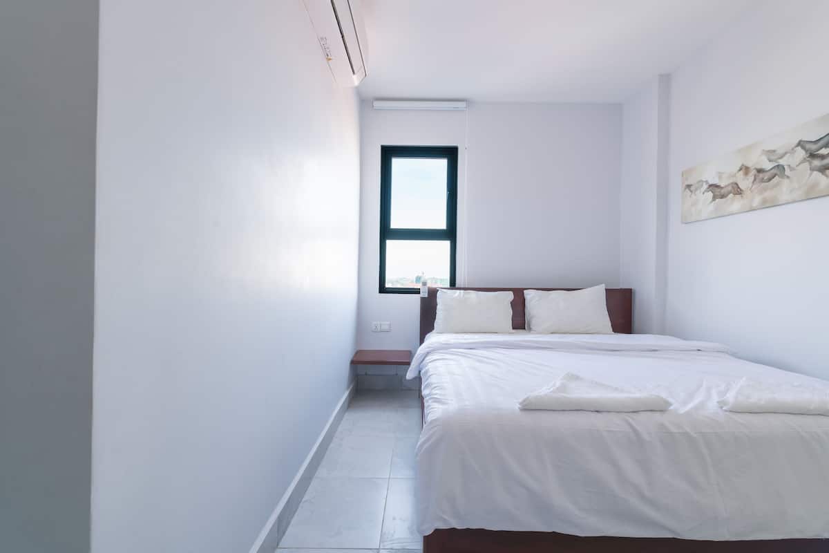 Habitación doble Deluxe | Edredón, camas con pillow-top y caja de seguridad en la habitación