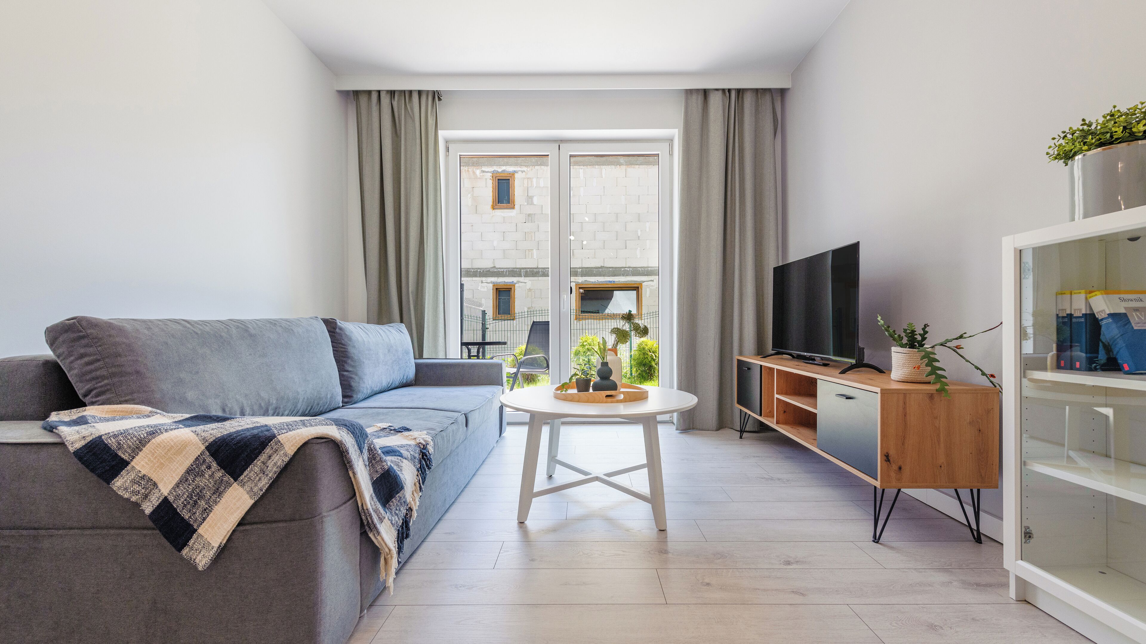 Appartement (B 4) | Woonruimte | Een flatscreentelevisie