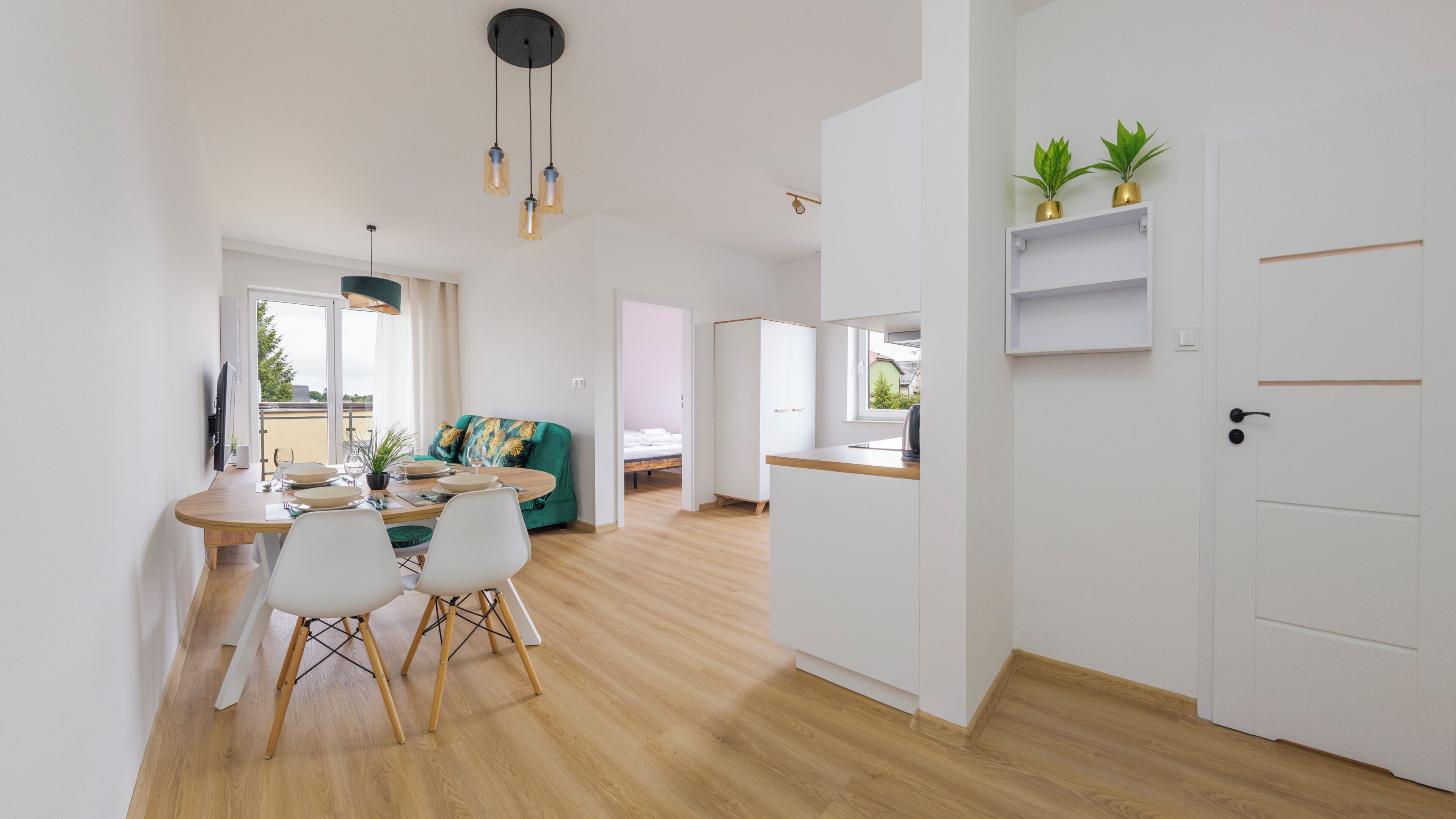 Appartement (14) | Woonruimte | Een flatscreentelevisie