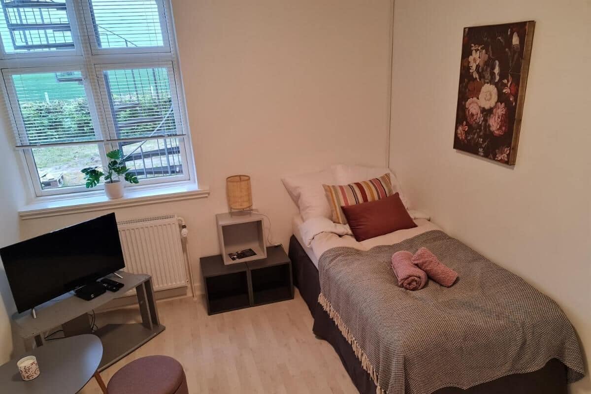 Premium bedding, memory-foam beds, blackout curtains, soundproofing