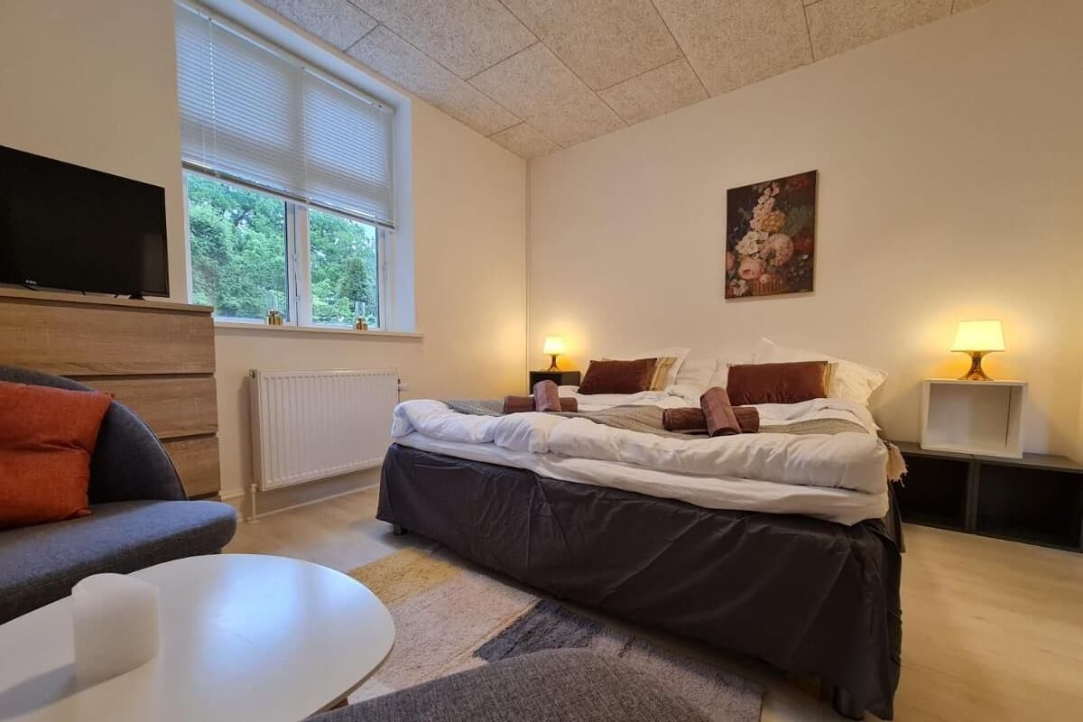 Premium bedding, memory-foam beds, blackout curtains, soundproofing