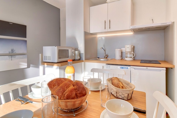 30-cm flat-screen TV with digital channels, TV