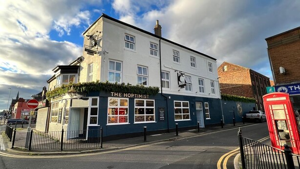 A two-story building with a sign reading "The Hoptimist." - The Hoptimist  (Stockton-on-Tees)