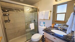 Bathtub, hair dryer, towels