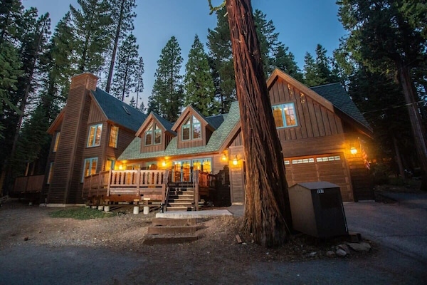 The exterior view of this charming classic Lake Tahoe cabin.