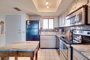 Fridge, microwave, stovetop, coffee/tea maker