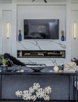 Smart TV, fireplace, stereo, printers