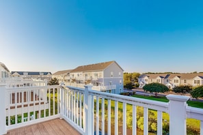 Stroll through a charming neighborhood with beautifully maintained lawns and a variety of homes.