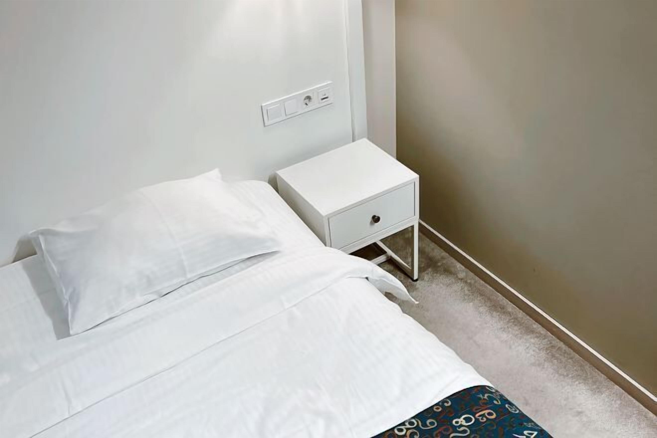 Minibar, coffres-forts dans les chambres, fer et planche à repasser