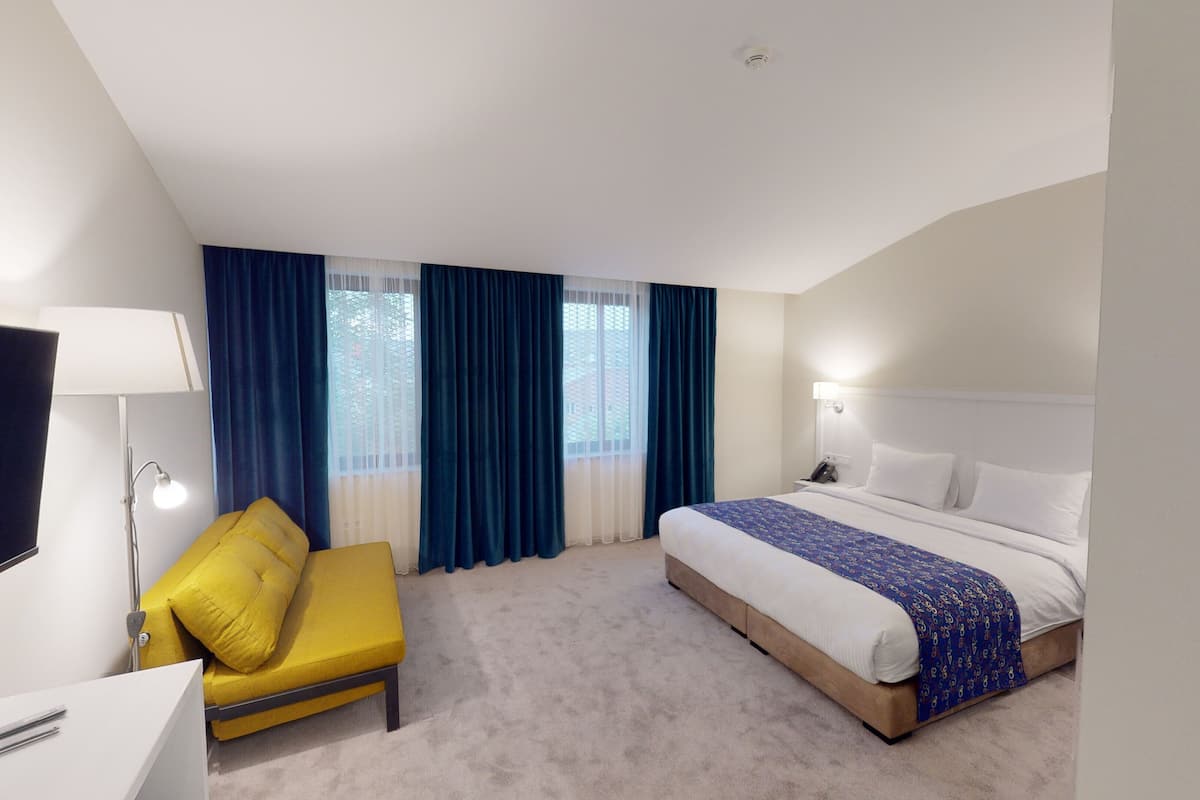Superior Double Room | Minibar, in-room safe, iron/ironing board, free WiFi