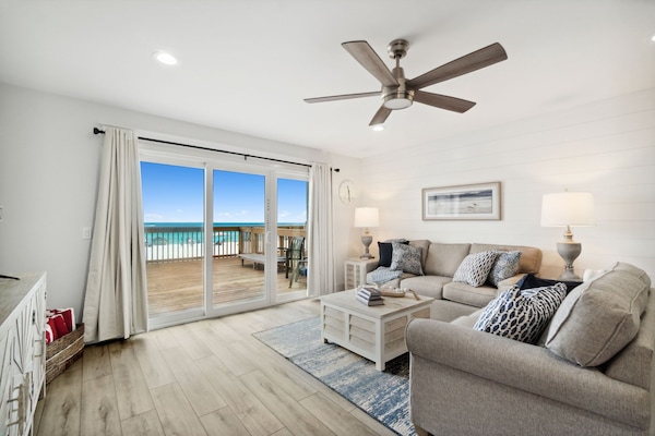 Living room look out directly on the beach.