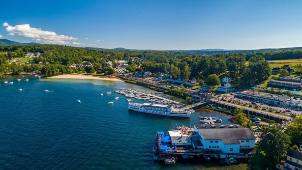 A coastal town with a marina, a large cruise ship docked, and a beach. - Cabin for two with lake views & access Now featuring AC Wi-FI and TV (Alton)