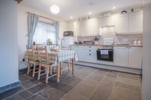 Fridge, microwave, oven, stovetop - Fferm-Llong Cottage (Ship Farm) - 2 Bedroom -Rhossili (Swansea)