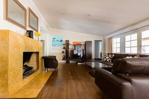 Smart TV, fireplace, books