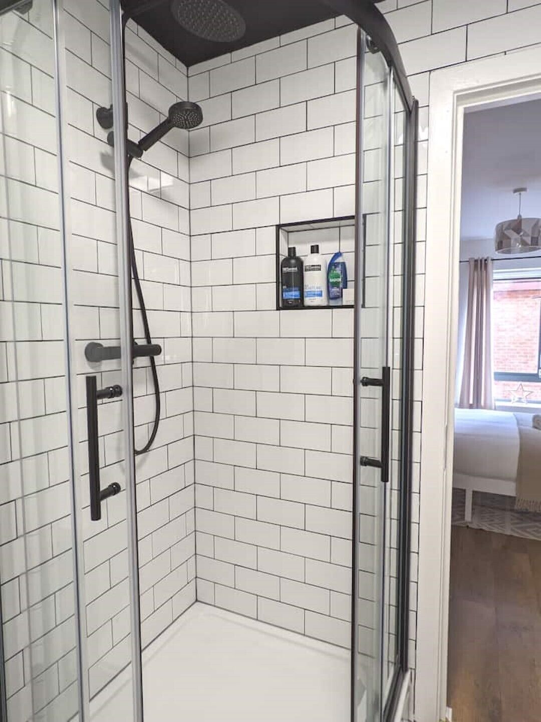 Combined shower/bathtub, hair dryer, towels, soap