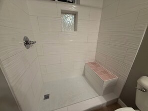 Combined shower/bathtub