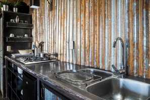 Fridge, coffee/tea maker, cookware/dishes/utensils