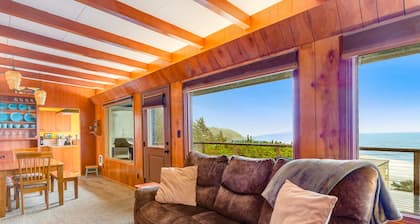 Two-story beach house with an ocean view, furnished deck, & washer/dryer