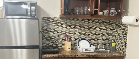 Fridge, microwave, coffee/tea maker, toaster