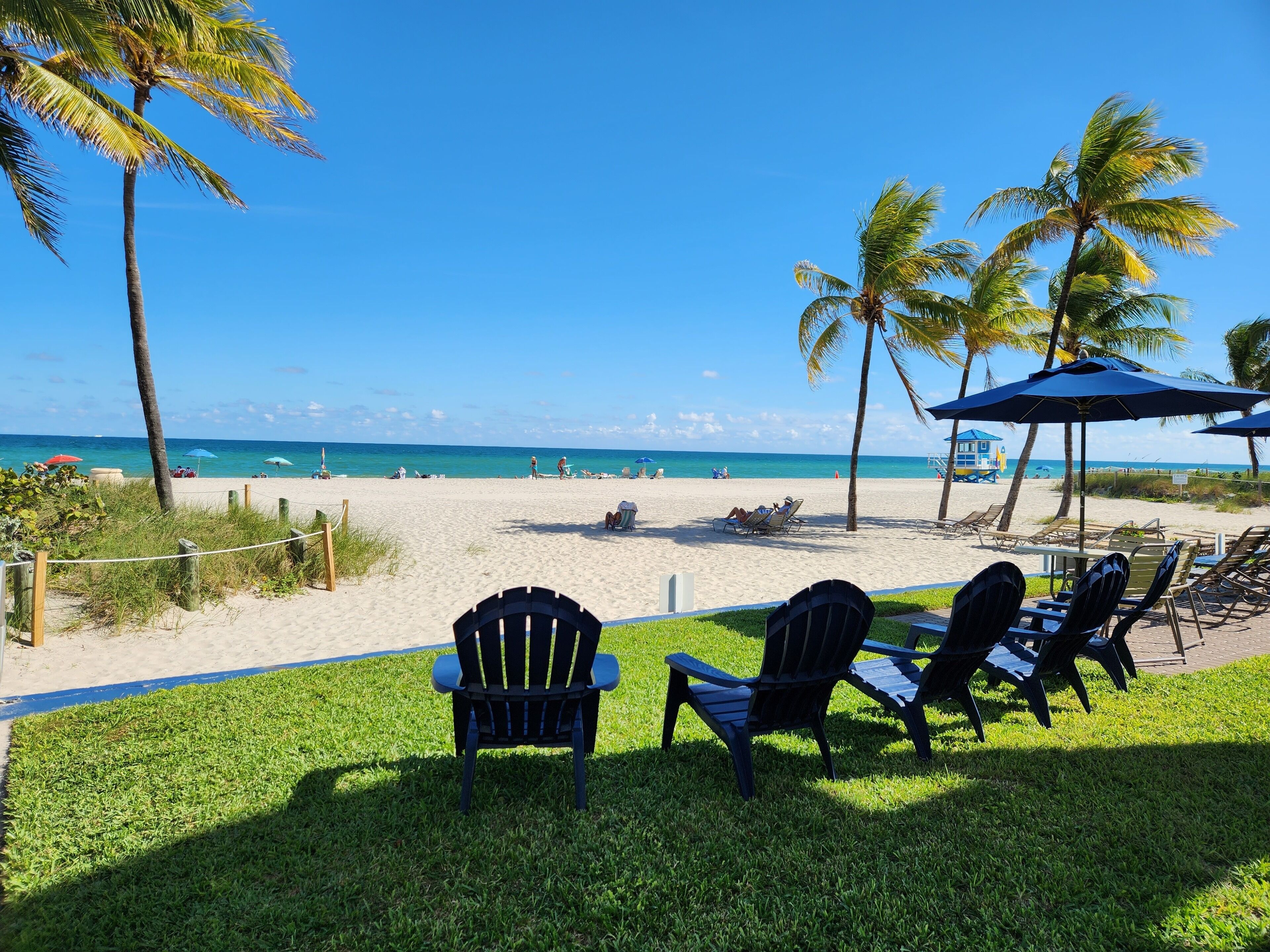 On the beach, sun-loungers, beach towels
