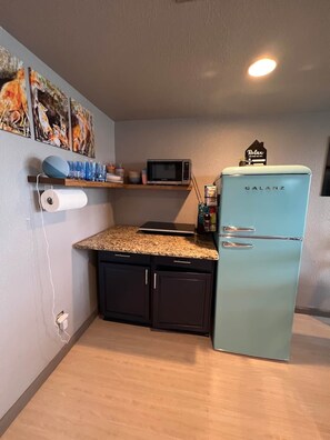 Fridge, microwave, stovetop, coffee/tea maker