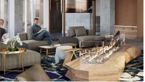 A modern lounge area with sofas, a coffee table, and a wood-burning fireplace. - Luxury 2 Bedroom Arlington Apartment (Arlington)