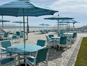 Outdoor dining - "SeaBliss" Oceanfront 1st floor Condo, steps from the ocean! (Daytona Beach)