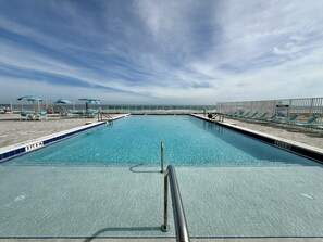 Outdoor pool, a heated pool - "SeaBliss" Oceanfront 1st floor Condo, steps from the ocean! (Daytona Beach)