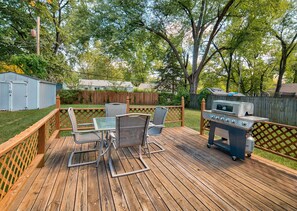Enjoy an outdoor space with a barbecue grill and comfortable seating.