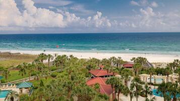 On the beach, sun loungers, beach towels