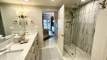 Shower, hair dryer, towels, soap