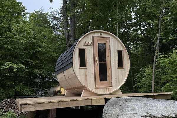 Wood burning barrel sauna for relaxing. Sauna, swim relax repeat!