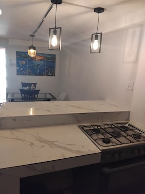 Basic Double Room, 1 Bedroom | Private kitchen - Leisure Duplex At Csompo Silver Manor (Tower Isle)