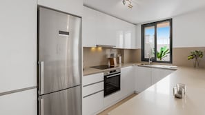 Fridge, oven, dishwasher, coffee/tea maker