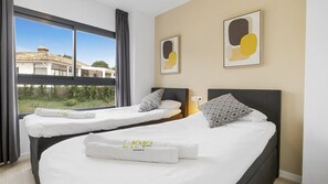 2 chambres, fer et planche à repasser, accès au Wi-Fi (inclus)