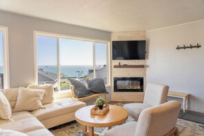 Smart TV, fireplace, books