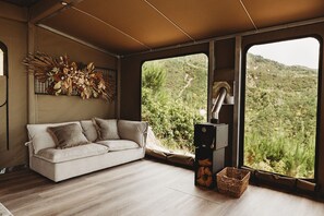 Panoramic Tent, 1 King Bed, Accessible, Ocean View | Living area | Fireplace - Drift Off Grid - Luxury Eco Glamping (Tata Beach)