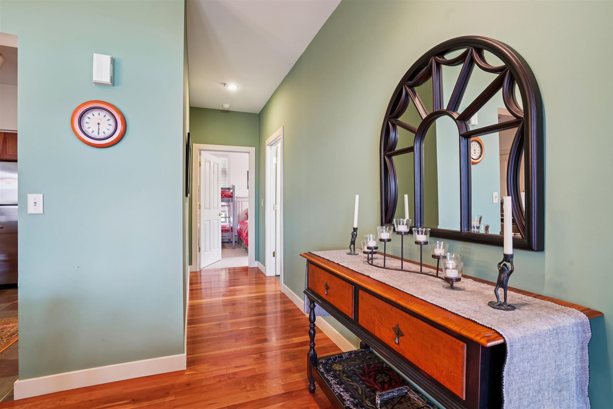 Interior Hallway - This inviting hallway connects the home's living areas while adding warmth and character to the open floor plan.