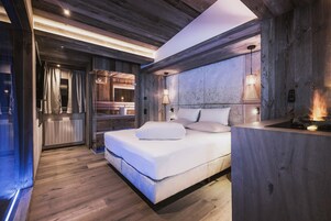 Suite panorámica | Ropa de cama de alta calidad, minibar, decoración individual