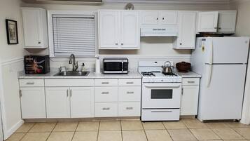 Fridge, microwave, coffee/tea maker, electric kettle